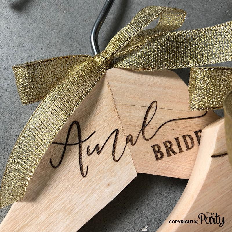 Engraved wooden hangers – The Party, Dubai