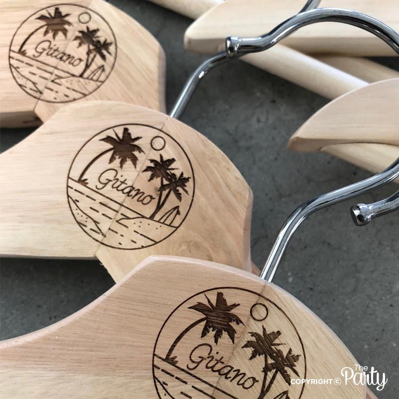 Set of 2 adult size engraved wooden hangers – The Party, Dubai