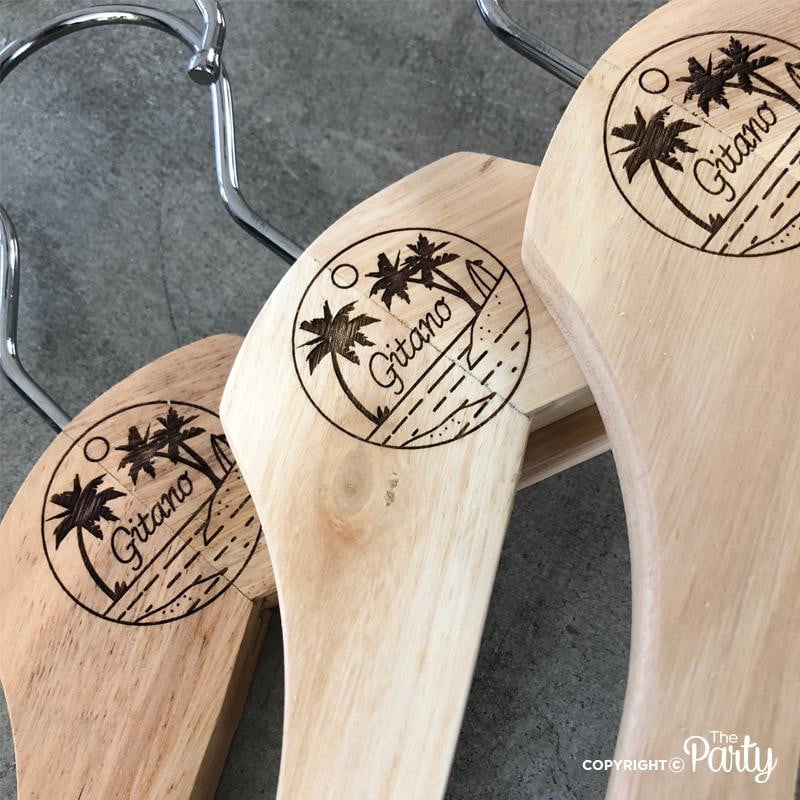 Set of 2 adult size engraved wooden hangers – The Party, Dubai