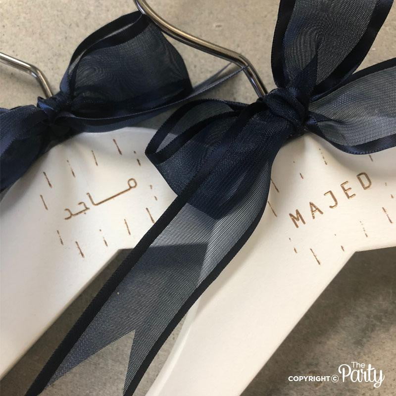 Set of 4 children's white engraved wooden hangers – The Party, Dubai
